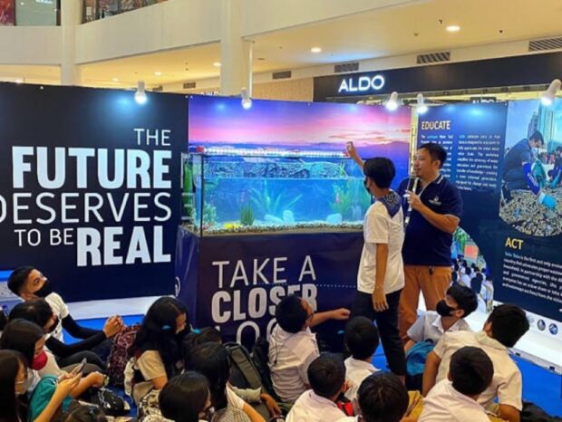 A Balara Elementary School student participates in the kick-off activity of Manila Water’s World Water Day Exhibit at UP Town Center in Quezon City. With the theme, “The Future Deserves to be Real”, the exhibit features the water company’s commitment to ensure that future generations enjoy the beauty of nature.