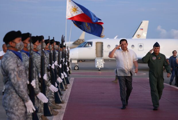 House Speaker Ferdinand Martin Romualdez with Philippine Air Force Commander Lt. General Stephen Parreño executing a hand salute to the honor guards during the arrival honor at the Mactan Air Force Base in Cebu on Thursday, March 30, 2023. Photo from  House Speaker Ferdinand Martin Romualdez.