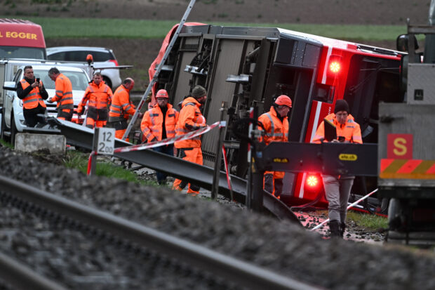 Fifteen people hurt in two separate train derailments that happened in quick succession in Switzerland