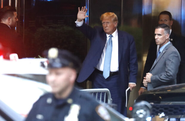 Former U.S. President Donald Trump arrives at Trump Tower following a deposition at the office of the New York Attorney General Letitia James on April 13, 2023 in New York City. Trump is being deposed for a civil lawsuit brought by the attorney general over allegations the Trump Organization falsified financial statements in order to obtain loans. The lawsuit seeks to remove Trump and his children from their roles in the organization and ban them from future leadership roles in the state of New York and repay $250 million that was allegedly obtained illegally.   John Lamparski/Getty Images/AFP (Photo by John Lamparski / GETTY IMAGES NORTH AMERICA / Getty Images via AFP)