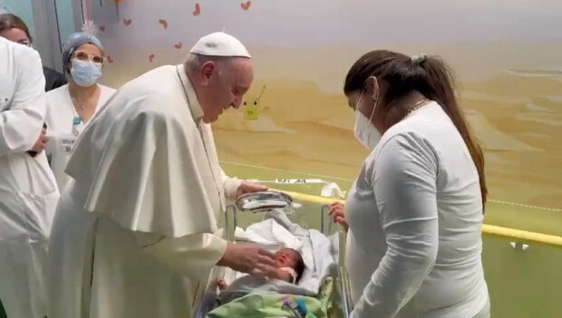 Pope Francis baptized a baby and greeted children in Rome's Gemelli hospital as he appeared to make a rapid recovery from a bout of bronchitis that caused him to be hospitalized earlier this week.