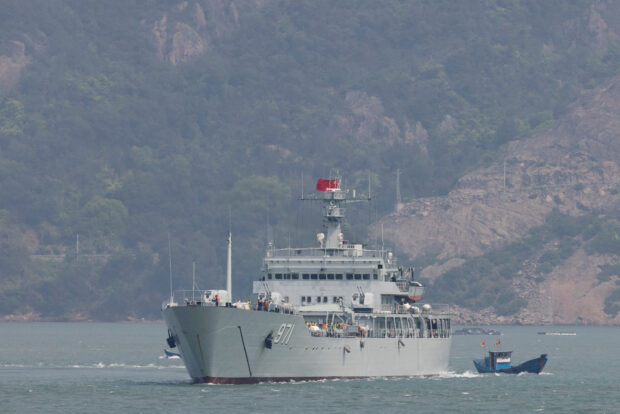A Chinese warship sails during a military drill near Fuzhou, Fujian Province, near the Taiwan-controlled Matsu Islands that are close to the Chinese coast, China, April 8, 2023.  REUTERS/Thomas Peter