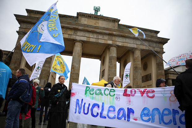 People protest as Germany shuts down its last three nuclear power plants in Berlin. STORY: As Germany ends nuclear era activist says still more to do