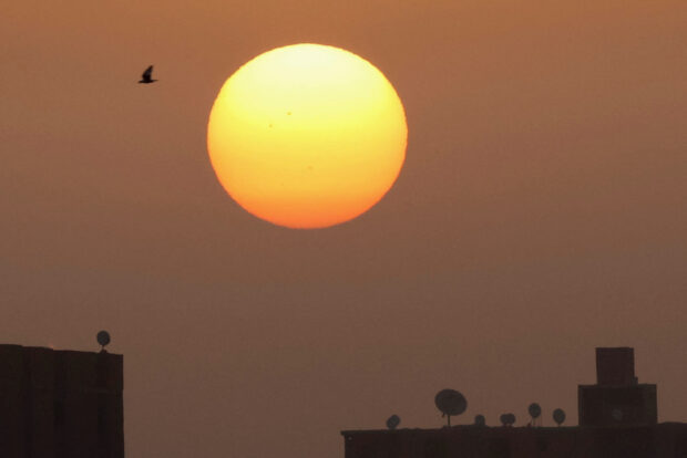 The sun rises in Cairo, Egypt, April 18, 2023. REUTERS/Mohamed Abd El Ghany