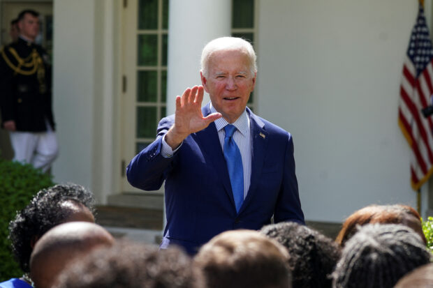 U.S. President Joe Biden waves after delivering remarks on "actions to advance environmental justice," prior to signing an executive order in the Rose Garden at the White House in Washington, U.S., April 21, 2023. REUTERS/Kevin Lamarque