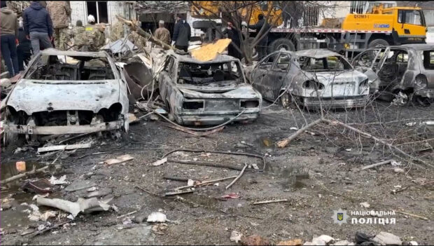 A view of destroyed vehicles near a heavily damaged residential building hit by a Russian missile, amid Russia's attack on Ukraine, in the town of Uman, Cherkasy region, Ukraine April 28, 2023. National Police of Ukraine/Handout via REUTERS