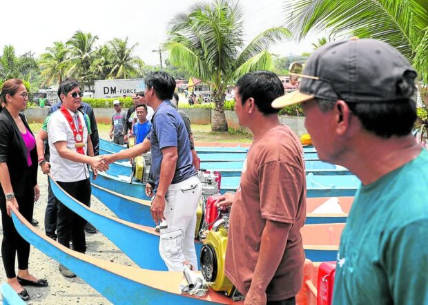 President Ferdinand Marcos Jr. leads a situation briefing on the oil spill and distribution of various assistance to at least 1,200 beneficiaries in Pola, Oriental Mindoro, on Saturday, April 15, 2023. STORY: Mindoro oil spill ruins nearly P1 billion in livelihood sources