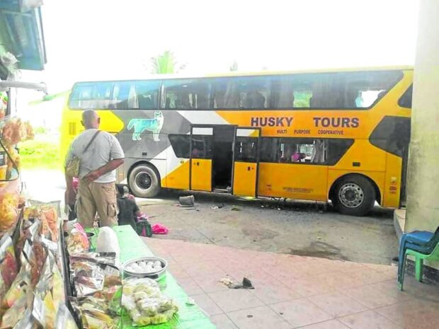 Bomb experts inspecting the Husky Tours bus, which was bombed while at the bus terminal of Isulan, Sultan Kudarat on Monday, April 17, 2023, recover an unexploded improvised explosive device on the upper deck of the vehicle, authorities said. STORY: Islamist militants eyed in Kudarat bus bombing