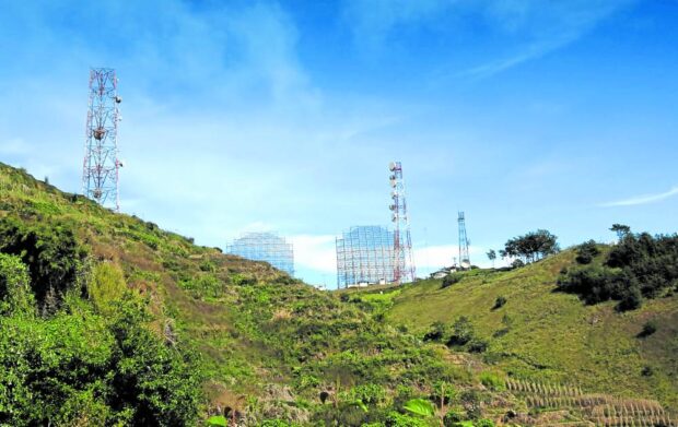 These transmitter towers and radar dishes on Mt. Cabuyao in Baguio City, as shown in this photo taken in 2014, are often jokingly referred to as the summer capital’s air conditioners. DICT signals cordillera