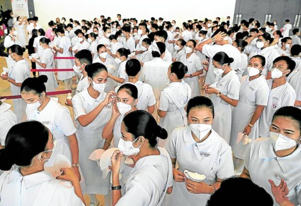 Nursing students of Centro Escolar University. STORY: Take up nursing, high school graduates urged