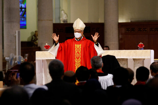 FILE PHOTO: Hong Kong bishop visits Beijing in historic trip amid Sino-Vatican tension