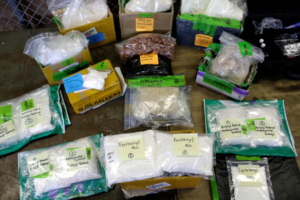 FILE PHOTO: Plastic bags of Fentanyl are displayed on a table at the U.S. Customs and Border Protection area at the International Mail Facility at O'Hare International Airport in Chicago
