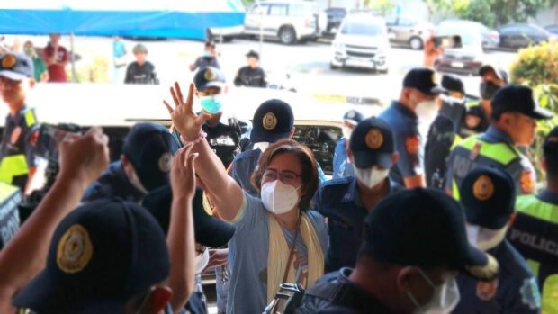 On Leila de Lima's acquittal, Amnesty International said: she should not have spent a single day in jail. In photo, de Lima is seen waving at supporters. 