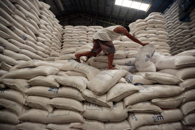 Sacks of rice are stockpiled at the National Food Authority (NFA) warehouse in Quezon City