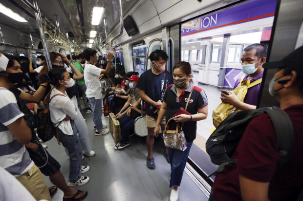 Passengers in an LRT 2 train in Recto Station in Manila STORY: 56 of 82 provinces placed under COVID-19 alert level 1