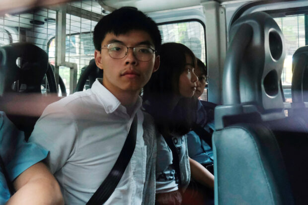 FILE PHOTO: Hong Kong activist Joshua Wong jailed for 3 months over information breach