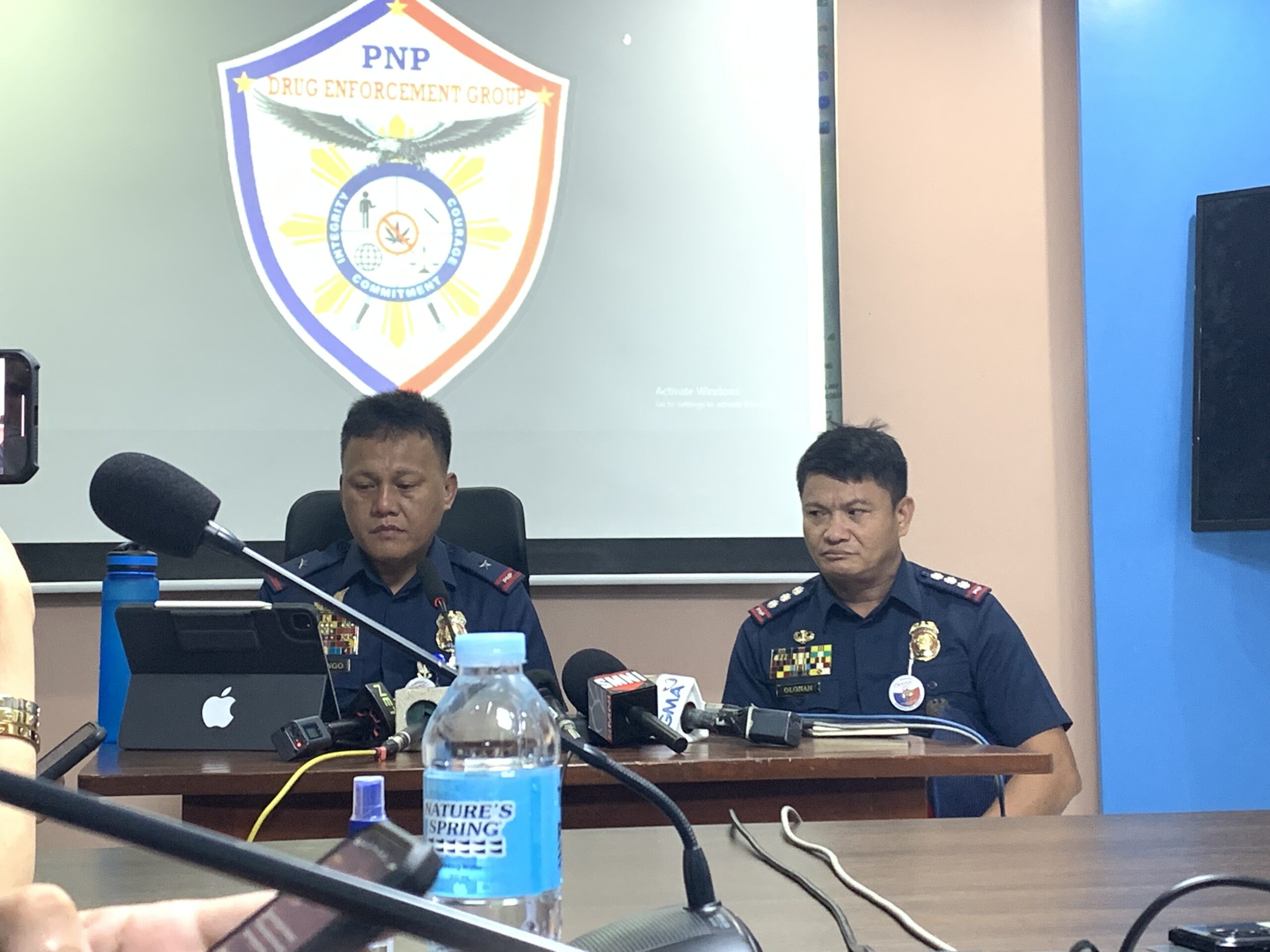 PDEG Police Brig. Gen. Narciso Domingo (left) and PDEG Special Operations Unit Region 4A chief Police Col. Julian Olonan hold a press conference at Camp Crame, Quezon City on April 11, 2023. INQUIRER.net / Faith Argosino drug case