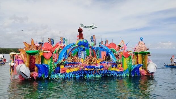 A colorfully decorated raft is featured in the Hugyaw sa Kadagatan Festival in Kauswagan, Lanao del Norte in observance of its 75th founding anniversary. 