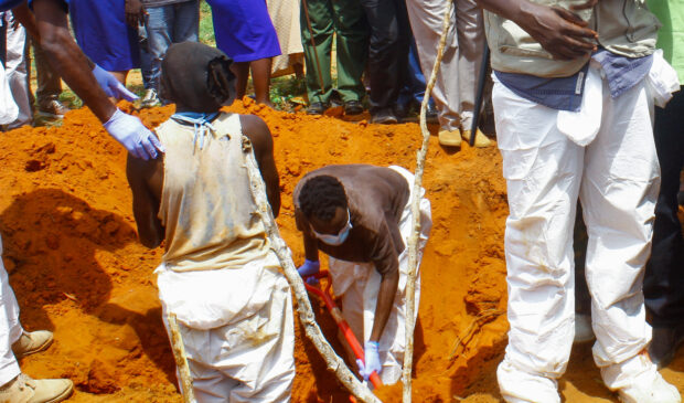Volunteers exhume bodies of suspected followers of a Christian cult in Kilifi