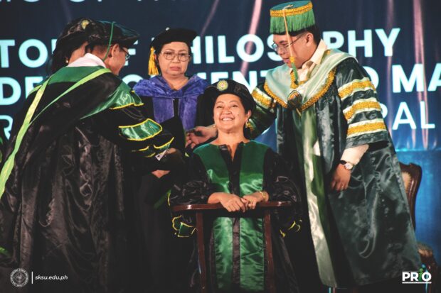 First Lady Liza Araneta-Marcos during the conferment rites for her honorary doctorate degree from the Sultan Kudarat State University liza marcos honorary doctorate