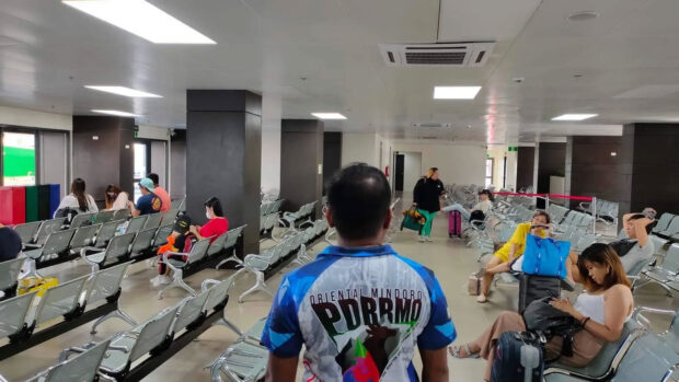 Passengers at the terminal building of Calapan port wait to board their vessels in this photo taken on Good Friday, April 7. (Photo courtesy of Oriental Mindoro PDRRMO)