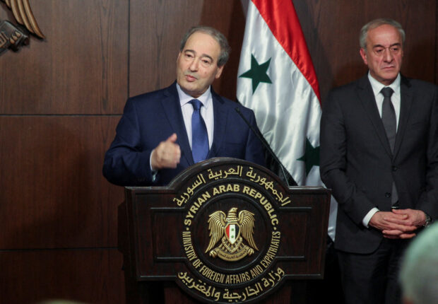 FILE PHOTO: Syrian Foreign Minister Faisal Mekdad speaks during a joint news conference with Iranian Foreign Minister Hossein Amirabdollahian in Damascus