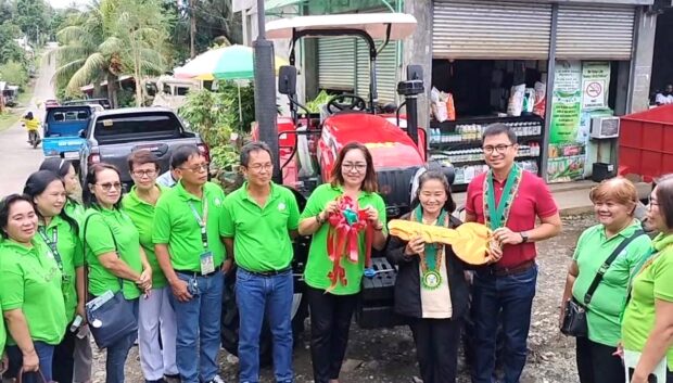 Beneficiaries of the Department of Agrarian Reform receive a farm tractor worth P2,675,000 in North Cotabato.
