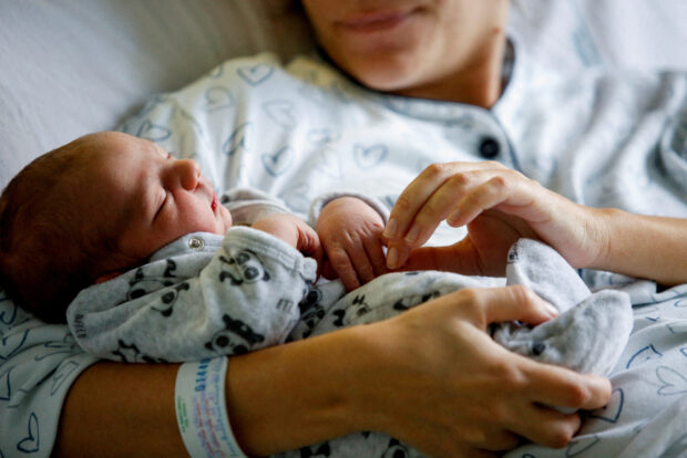 FILE PHOTO: Newborn baby Leonardo rests on his mum Viviana Valente's arms