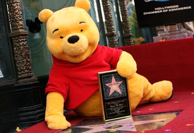 Winnie The Pooh receives a star on the Hollywood Walk of Fame in front of the El Capitan Theatre on April 11, 2006 in Los Angeles, California.  (Photo by Michael Buckner/Getty Images) (Photo by Michael Buckner / Getty Images North America / Getty Images via AFP)