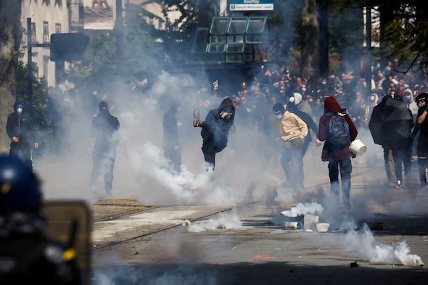 Traditional May Day labor union march in Nantes STORY: French police battle black-clad anarchists during May Day rallies