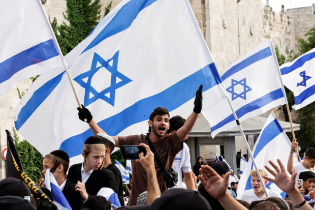 An Israeli man shouts as he gathers with others at Damascus gate to Jerusalem's Old city marking Jerusalem Day, in Jerusalem May 18, 2023. REUTERS/Ammar Awad