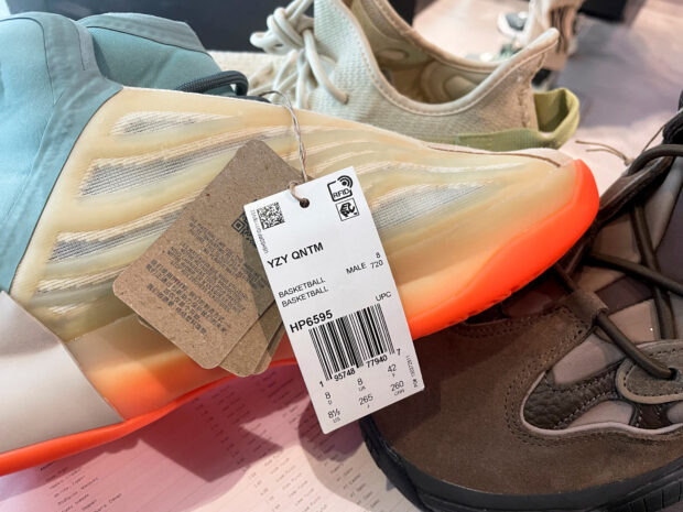 A pair of Yeezy shoes are seen in a Foot Locker store on the day Adidas terminated its partnership with the American rapper and designer Kanye West, now known as Ye, in Garden City, New York, U.S., October 25, 2022. REUTERS/Shannon Stapleton
