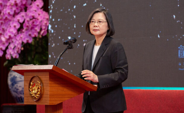 Taiwan's President Tsai Ing-wen vows to maintain the status quo of peace and stability across the Taiwan Strait amid high tensions with China