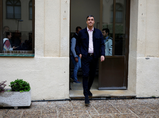Spain's Prime Minister Pedro Sanchez appears after he casts his vote at a polling station in Madrid STORY: Spain’s Sanchez gambles on snap election after regional ballot rout