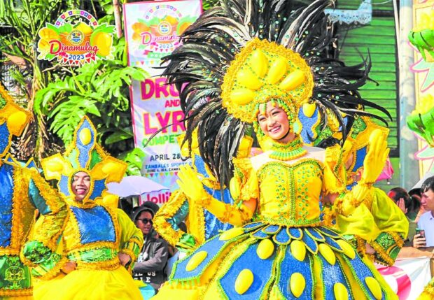 Street dancers take center stage during the Zambayle Street Dance Parade and Competition in front of the Zambales’ provincial capitol in Iba town on April 29, 2023. STORY: Mango Festival celebrates Zambales’ sweet bounty