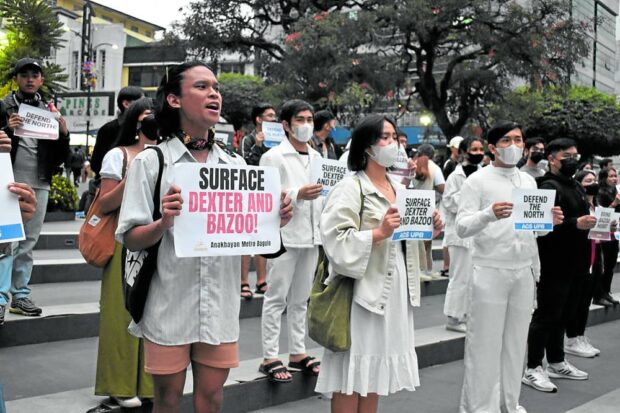 Membersof progressive groups in the Cordillera stage a rally in Baguio City on Thursday, calling for the surfacing of Gene Roz Jamil de Jesus and Dexter Capuyan. 