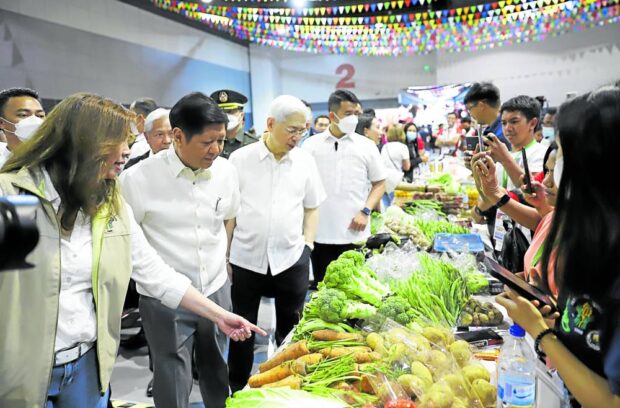 President Marcos opens a Kadiwa outlet to provide consumers a temporary respite from high prices. STORY: BSP official questions viability of Kadiwa stores