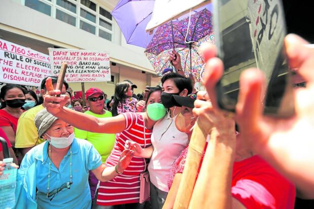  Ousted Legazpi City Mayor Carmen GeraldineRosal meets with her supporters on Monday to assure them that she will exhaust all legal remedies to contest her disqualification as a candidate during the May 9, 2022, mayoral race.
