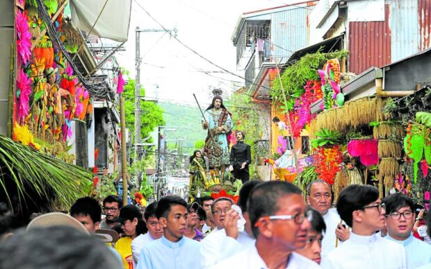THANKSGIVING In Lucban, Quezon, every house along the procession route of the farmer’s patron saint, San Isidro de Labrador, during the Pahiyas Festival features multicolored “kiping” andfresh farm produce as a symbol of thanksgiving, as shown in this photo taken before the pandemic. 