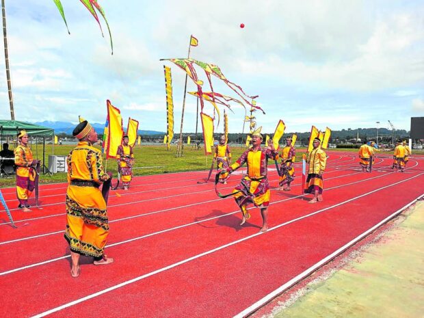 In this July 2022 photo, young Maranaws stage a cultural performance at the newly built track oval in the Sarimanok Stadium in Marawi City. STORY: Marawi completes key infrastructure projects 6 years after siege