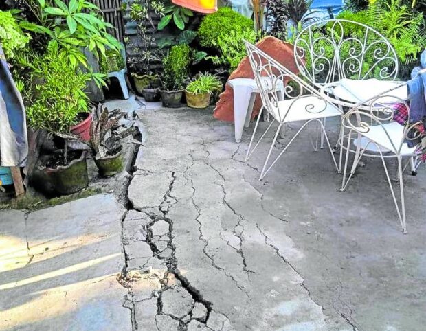 CRACKS Ground fissures, as shown in this photo taken on May 12, threaten at least 10 houses in San Carlos City, Negros Occidental. —PHOTO COURTESY OF THE SAN CARLOS CITY DISASTER RISK REDUCTION MANAGEMENT OFFICE
