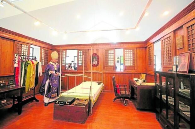MUSEUM DISPLAY Cebu Archbishop Jose Palma blessesthe bed and other belongings of the late Archbishop Teofilo Camomot at a museum in “Domus Teofilo.” —CONTRIBUTED PHOTO