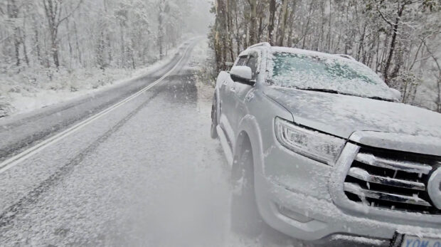 A general view of heavy snowfall in Namadgi National Park, Australia, May 7, 2023 in this screen grab obtained from a social media video. 