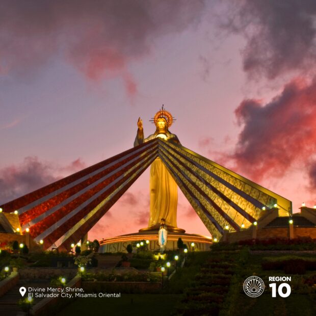 The Divine Mercy Shrine in El Salvador City, Misamis Oriental glows at dusk. The shrine is a populaR religious destination in Northern Mindanao.