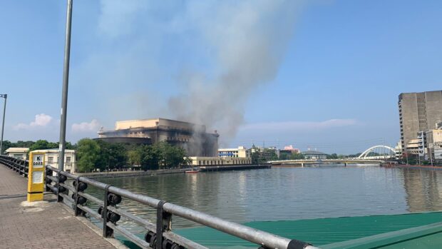 Smoke billowing from the Manila Central Post Office. An undisclosed number of  Philippine Identification cards (PhilID) were “affected” by the fire that hit the Manila Central Post Office on Monday, said the Philippine Statistics Authority (PSA).