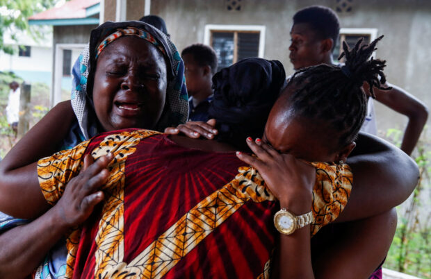 FILE PHOTO: Kenyans seek relatives among starvation cult victims in Kilifi