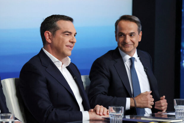 FILE PHOTO: Greek Prime Minister and conservative New Democracy party leader Kyriakos Mitsotakis and leftist Syriza party leader Alexis Tsipras, take part in a televised debate at the headquarters of the state broadcaster ERT, in Athens, Greece, May 10, 2023. REUTERS/Alexandros Avramidis