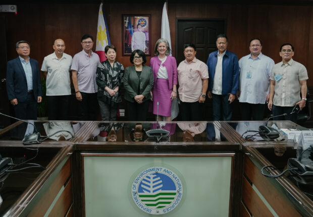 DENR officials meet with representatives of the shipping industry to discuss how to prevent another oil spill. 