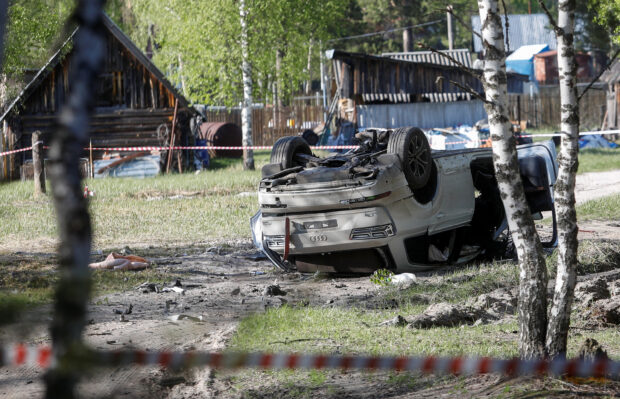 Russia blames Ukraine and US for car bomb that wounded writer