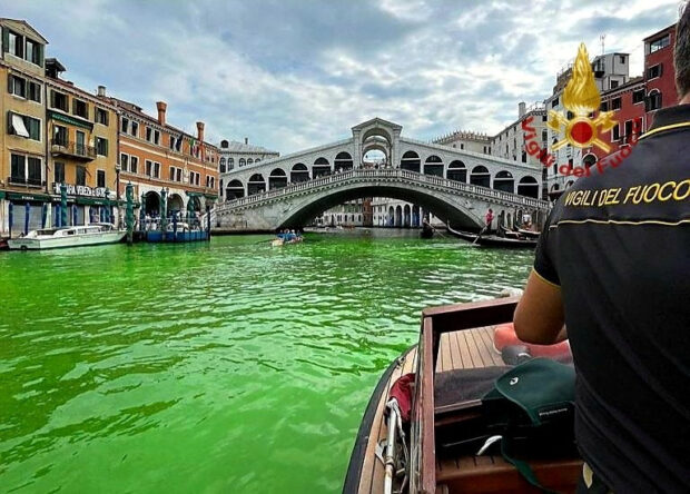 Venice's waters turn fluorescent green